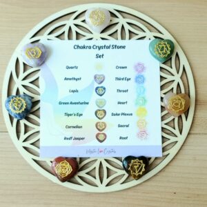 chakra stones with flower of life crystal grid