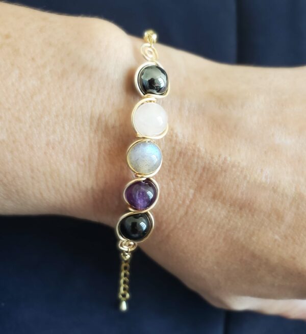 Protection bracelet for empaths in amethyst, rose quartz, labradorite, hematite, and black tourmaline.