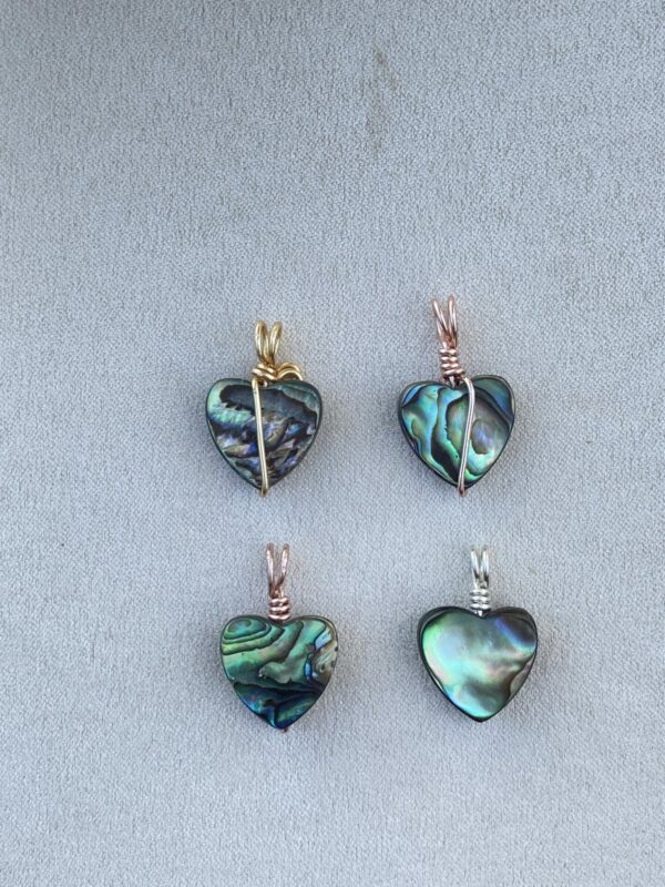 Back view of gorgeous abalone shell heart pendants