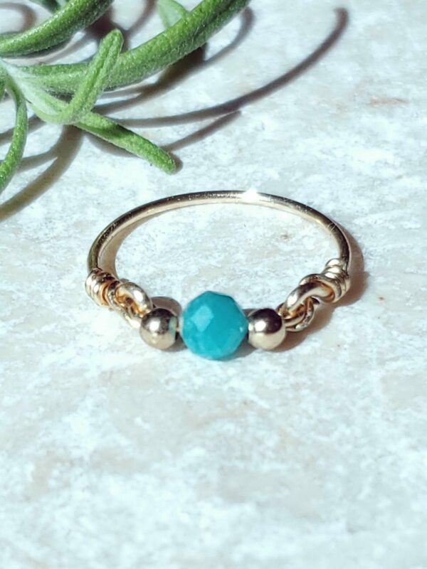 Handmade Amazonite ring with a captivating blue-green faceted gemstone.