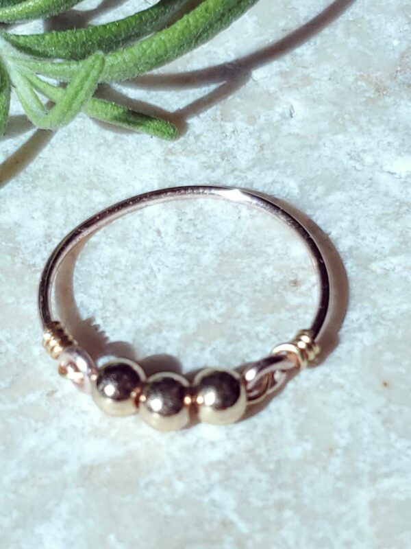 Handmade 3 Gold beaded ring with a minimalist design.