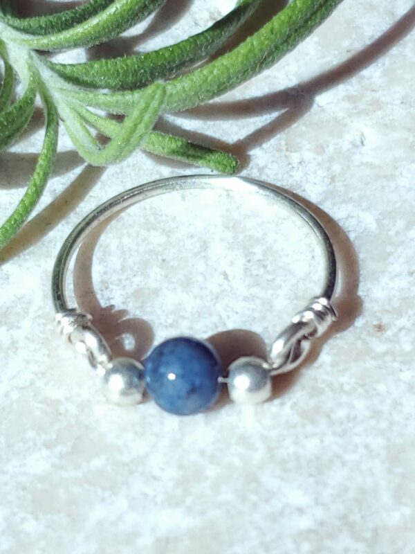 Handmade kyanite ring with a striking blue gemstone.