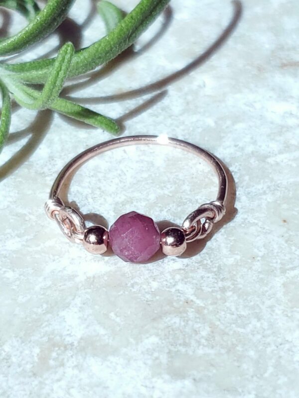 Handmade Pink Tourmaline ring with a delicate pink hue and sparkling facets.