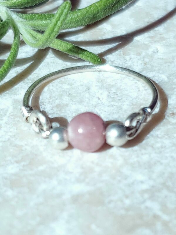 Handmade Rhodochrosite ring with a delicate pink hue.